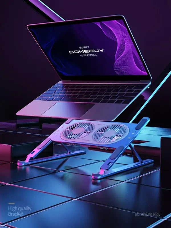 Laptop on a cooling stand with a dark background